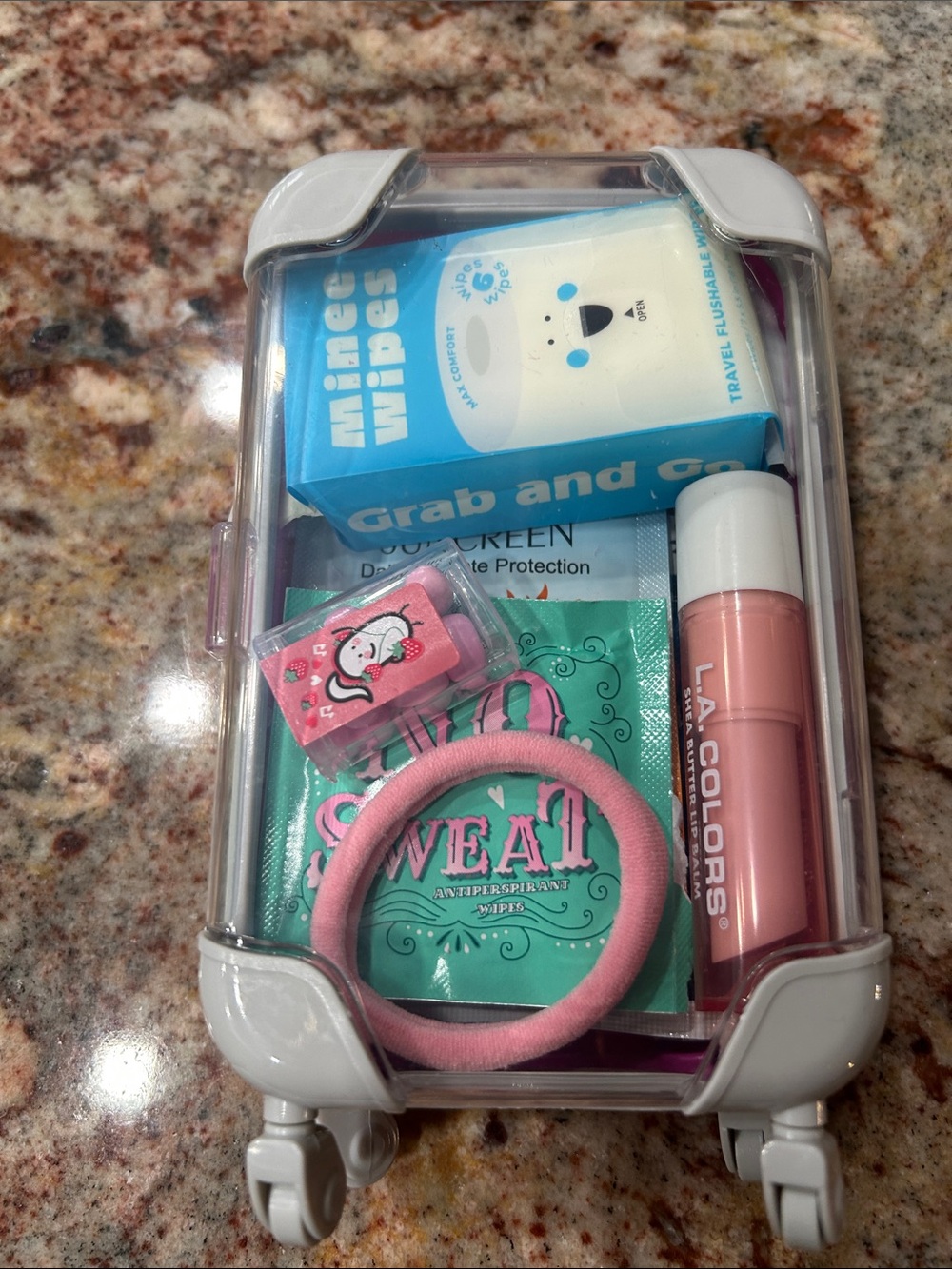 L.A. COLORS Kids Travel Care Kit in Pink with moving wheels